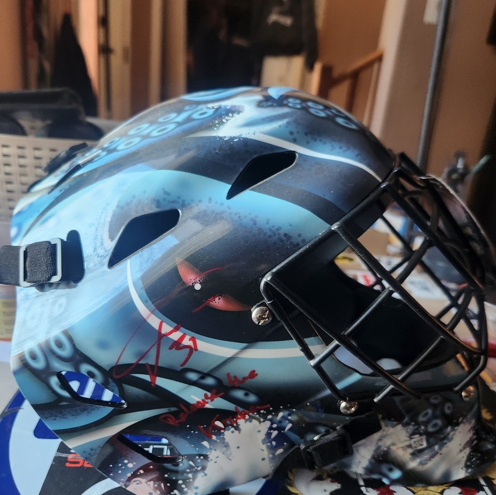 Phillip Grubauer inaugural Kraken goali helmet signed.